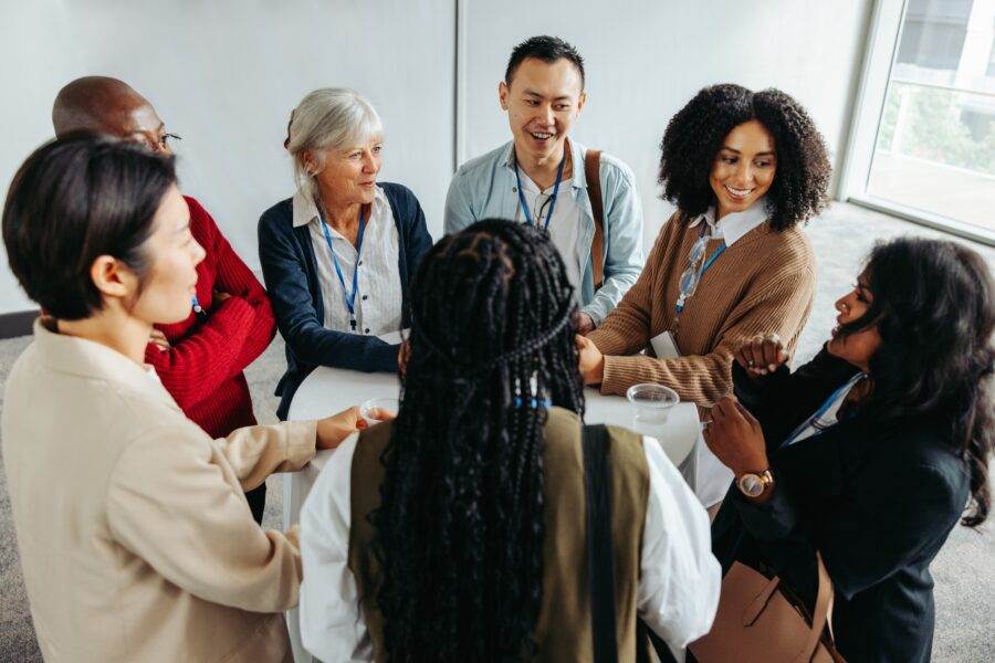 Group of people sitting together and talking